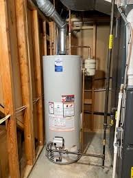Outdated tank-style unit before tankless water heater replacement by Prestige Plumbing in Weatherford TX.